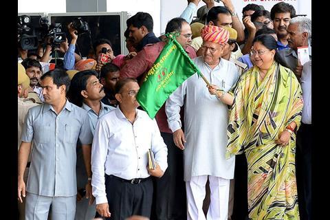 Chief Minister of Rajasthan Vasundhara Raje flagged off the inaugural train to open the Jaipur metro.
